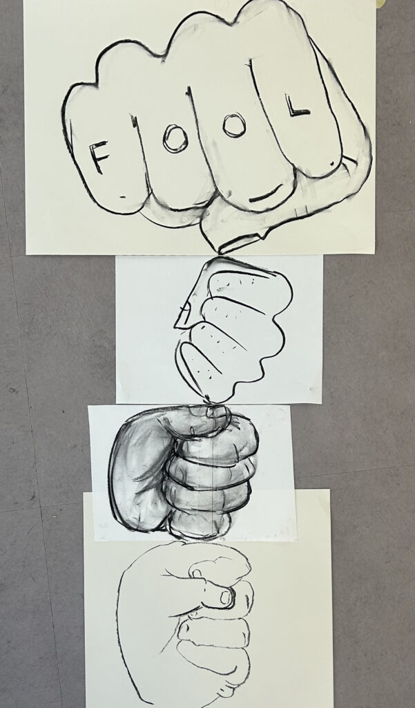 AI generated: The image shows four drawings of fists suspended one above the other. The letters "F O O L" are written on the knuckles of the top fist.
